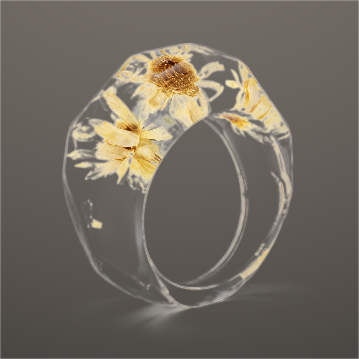 Golden Daisy clear faceted resin ring with cream and soft golden pressed flowers across the top