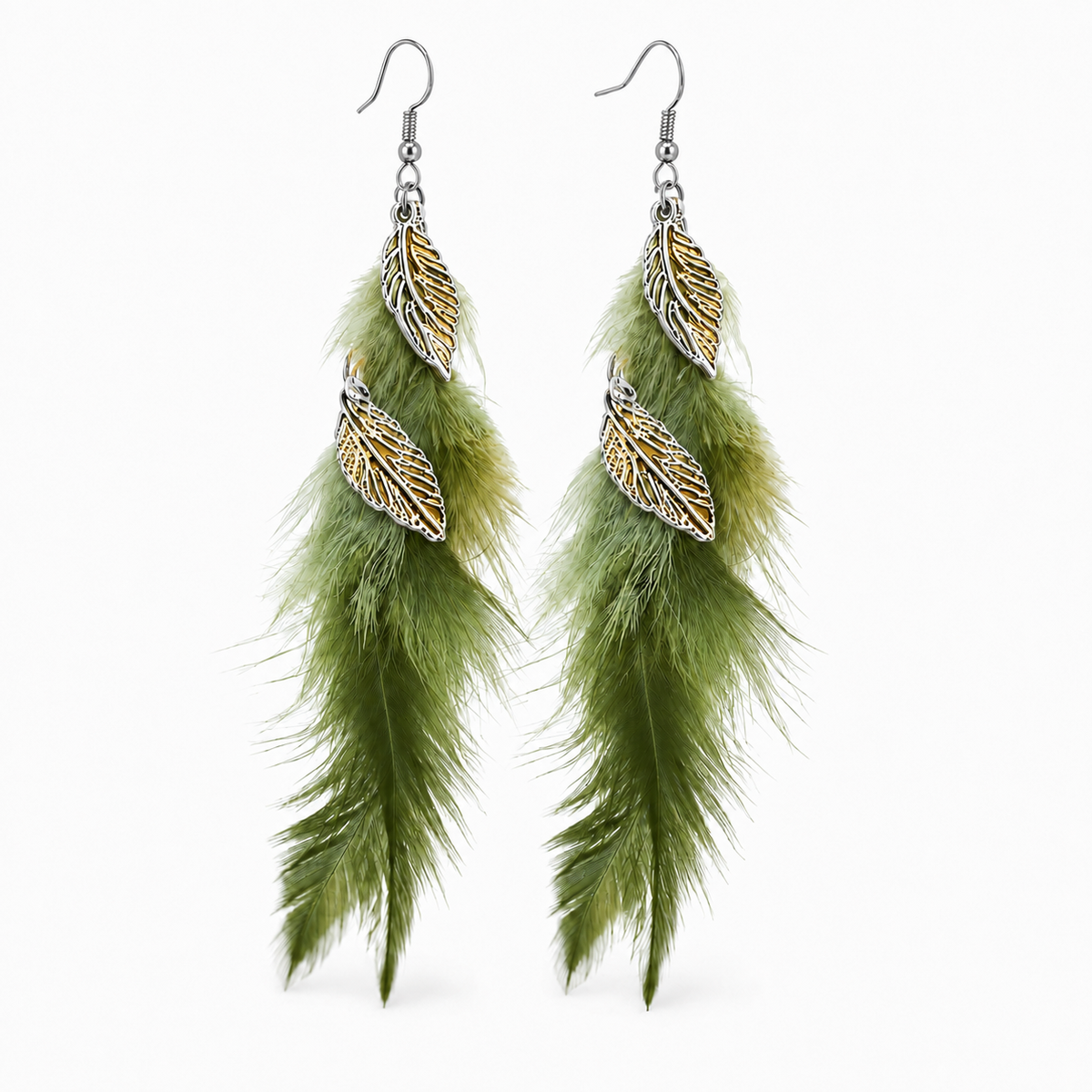 Pair of long green feather earrings with mixed silver- and gold-tone leaf charms on a white background.