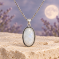 Vertical Lunar Reflection oval Moonstone pendant with bail at the top