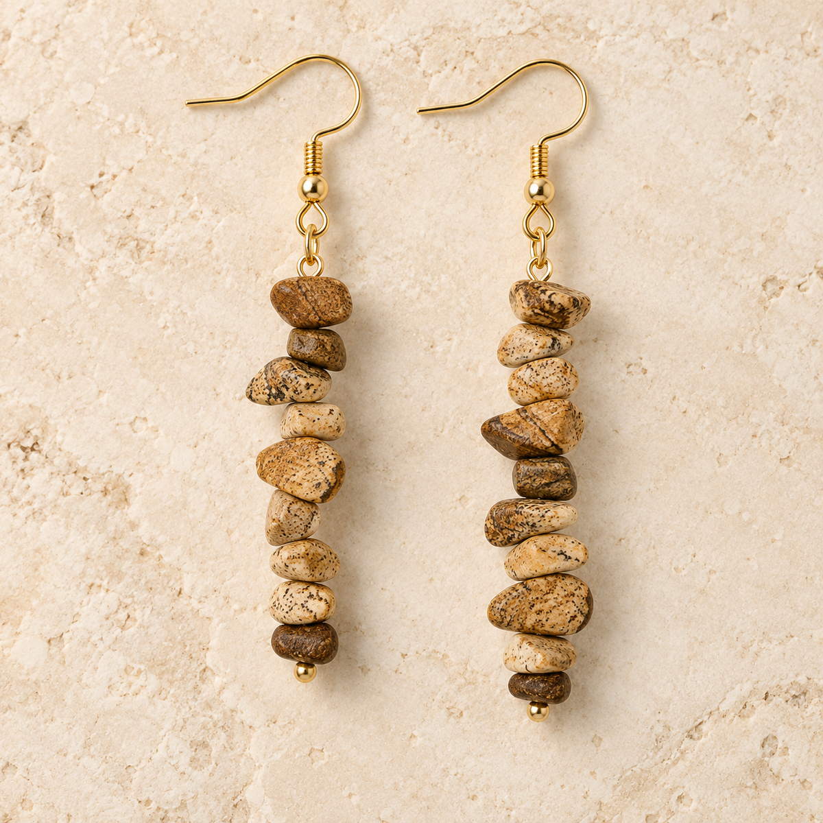 Picture Jasper stone chip drop earrings with gold-tone hooks on a warm cream background.