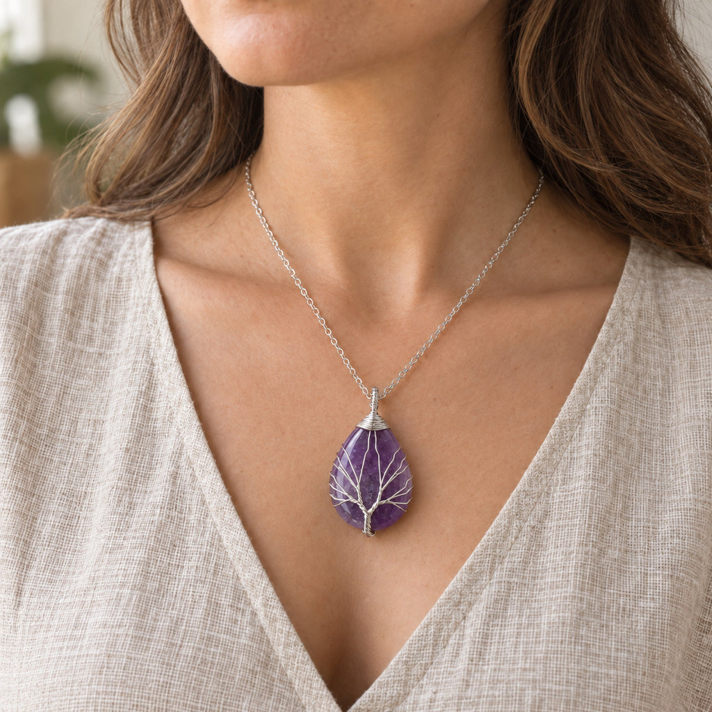 Model wearing the Amethyst teardrop Tree of Life necklace.