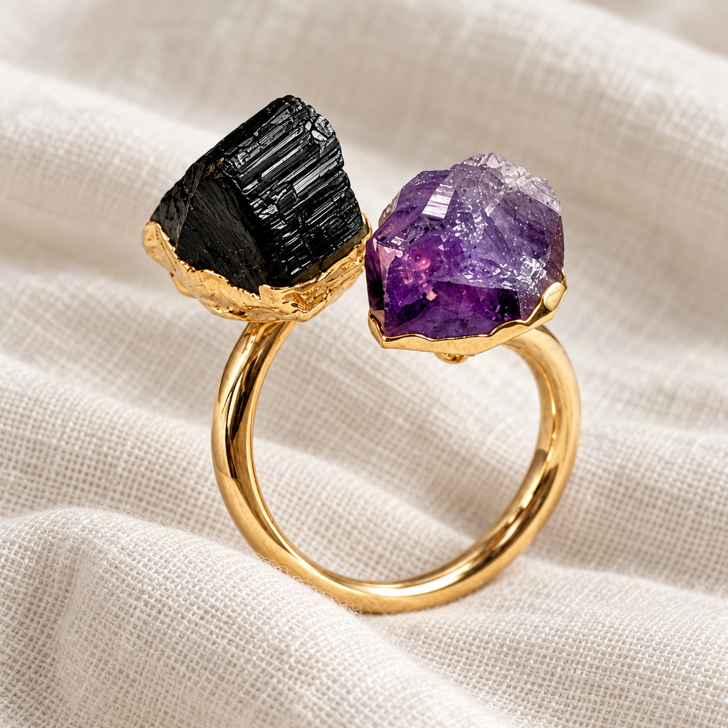 Black tourmaline and amethyst ring on ivory linen, close detail view
