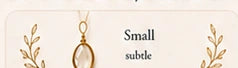 Small — subtle, shown with a small pendant